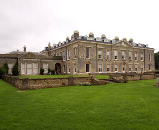 : England’s Althorp House, Lady Diana’s family home, is the center of a huge estate on which archaeologists discovered a 40,000-year-old Neanderthal camp.		Source: Steve Daniels / The rear of Althorp House / CC BY-SA 2.0