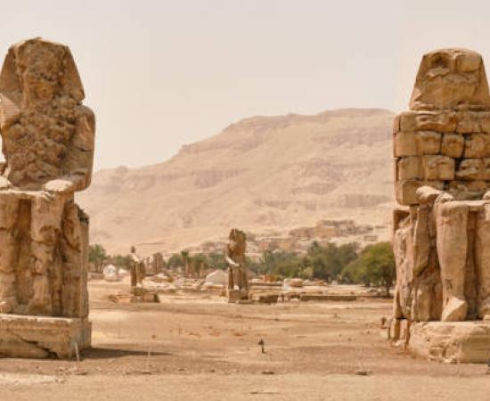 Colossi of Memnon (statues of Pharaoh Amenhotep III), Luxor, Egypt.  
