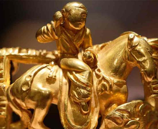 This decorative belt buckle is of a nomad horseman spearing a boar. The rider wears the steppe dress, his hair is tied into a hair bun characteristic of the oriental steppes, and his horse has characteristically Xiongnu horse trappings. Dated to the 2nd-1st century BC.	Source: Public Domain