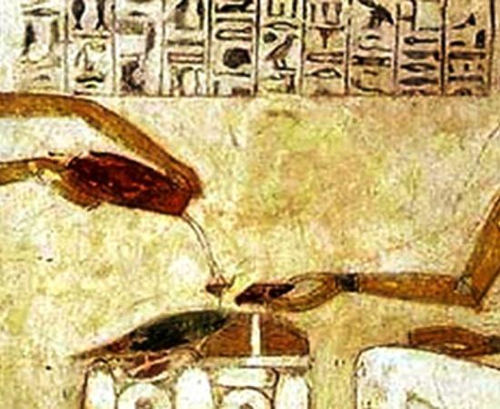 Egyptian hieroglyphics depict the pouring out of beer.