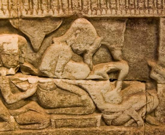 Ancient Khmer carving of childbirth. 