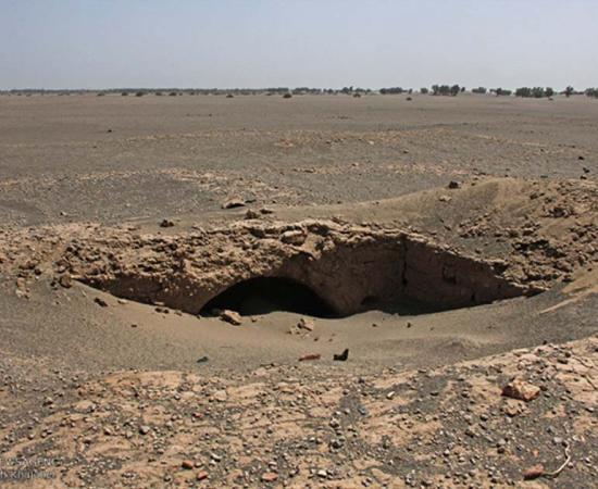 The site consists of structures that archaeologists are examining and excavating to determine whether they are of a necropolis or a settlement. The structures are adobe.