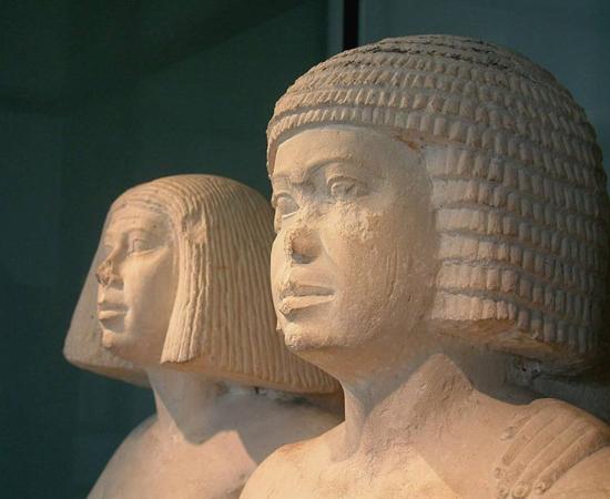 Egyptian couple wearing formal wigs of the 4th of 5th dynasties. 