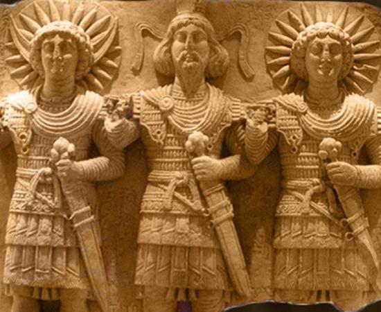 Palmyrean triad: Baalshamin, master of the skies, the Moon-god Aglibol and the Sun-god Malakbel (Yarhibol). Cultual relief, limestone, first half of the 1st century AD, found in one of the routes to Palmyra. The stele bears religious inscriptions carved by passers-by.