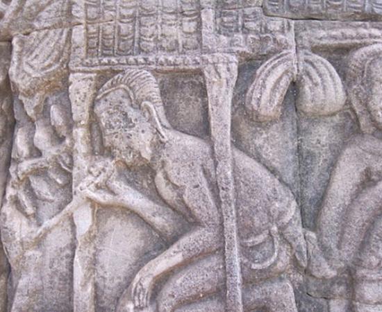 Ancient relief carving depicting drug use
