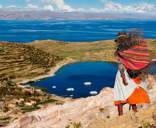 Aymara woman by the Titicaca Lake, collecting staples of an Andean Paleo diet.. Source: Rafal Cichawa/Adobe Stock
