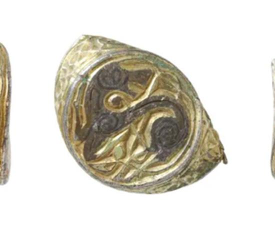 The intricate Anglo- Saxon artifact has a diameter of only 19.4mm (0.7 in) and features a depiction of an animal at the top, most probably a horse. Source: ANDREW WILLIAMS/NORFOLK COUNTY COUNCIL