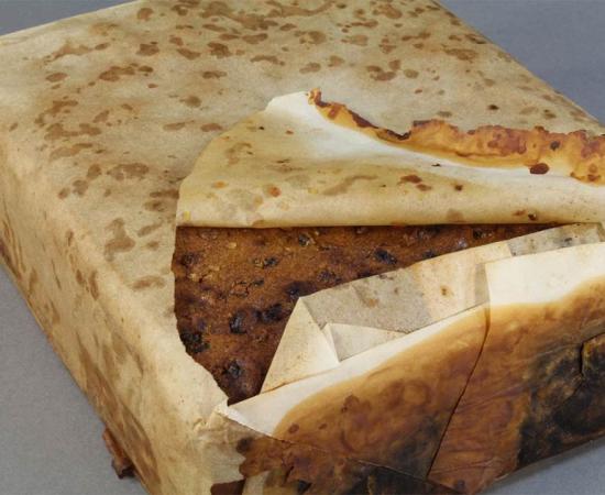 Found amongst almost 1,500 artifacts conserved from a group of buildings at Cape Adare, this Antarctic fruitcake made by Huntley & Palmers was discovered wrapped in paper within the rusted remains of its original tin. It was probably left behind by Scott’s Terra Nova expedition. Source: Antarctic Heritage Trust