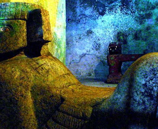 Statue of the God Chac-Mool, located inside a chamber in the pyramid of Kukulcán in Chichén Itzá, Mexico 