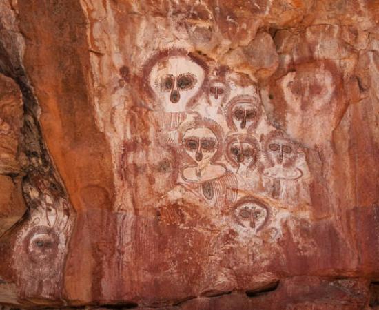 Wandjina rock art on the Barnett River, Mount Elizabeth Station, Australia.