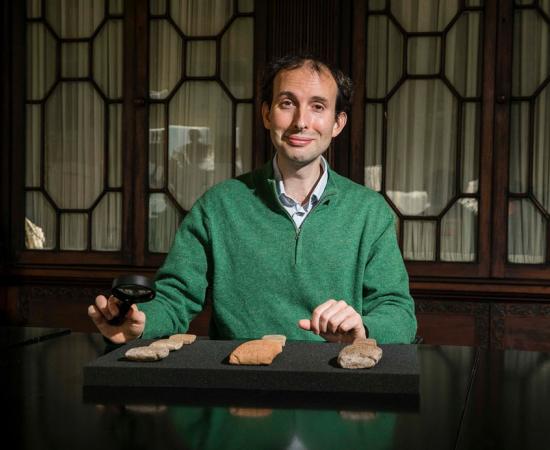 Dr. Martin Worthington, who was hired to attain authenticity in Marvel’s Eternals, in the Library of Trinity College Dublin pictured with a collection of cuneiform tablets written in ancient Babylonian language. Source: Trinity College Dublin