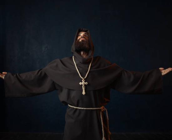 A Benedictine monk in a black robe