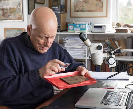 Roger Tomlin deciphering one of the 405 Bloomberg Tablets found at the heart of Roman Britain, Londinium, which are the oldest written documents ever found in the UK.