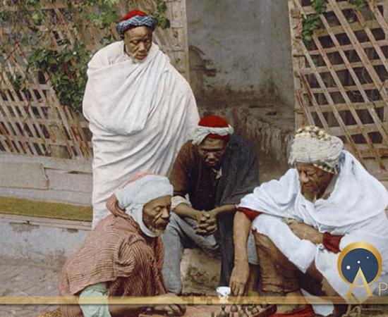 Men Playing Board Games in Alegria (1890 – 1900) (Public Domain)