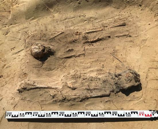 The buried children found in Poland were in sandy ground and were arranged on an east-west axis, all with heads to the west on their backs with the hands at their sides. Source: Arkadia Firma Archeologiczna