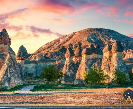 Enchanted landscape of Fairy Chimneys forms of sandstone in the canyon near Cavusin village, Cappadocia (Andrew Mayovskyy / Adobe Stock)