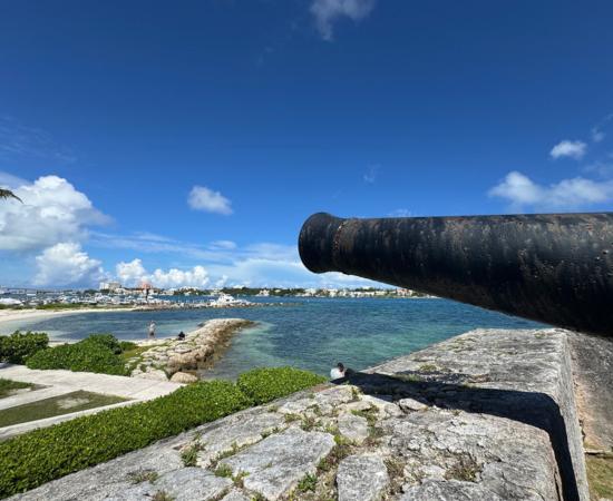 A cannon in Fort Montagu protects the entrance to Nassau's pirate harbor at New Providence Island in the Bahamas