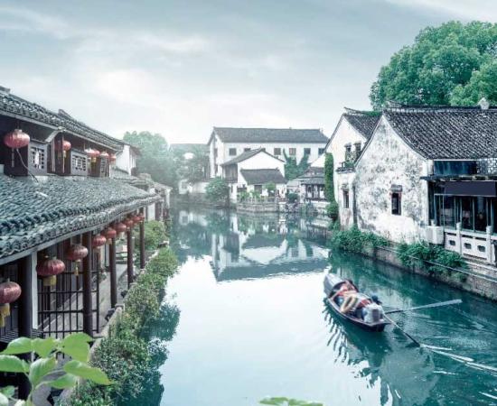 The waterway wonders of China’s Grand Canal are both picturesque and ancient in some sections but also super modern and unattractive in others. This part of the canal is in the ancient, preserved section of Shaoxing, Zhejiang, China. Source: gui yong nian / Adobe Stock