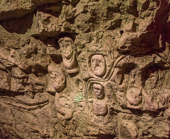 Carving in Chislehurst Caves.