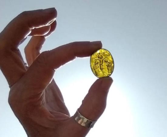 The jewel discovered in England featuring Christs crucifiction, with Mary and John