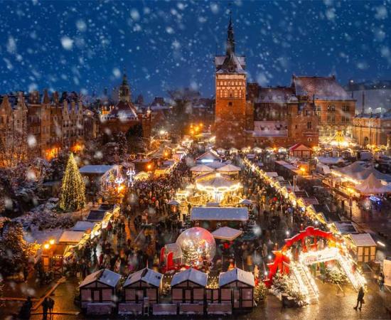 You can find beautiful, fairy-tale like Christmas markets around Europe, with many dating back hundreds of years. The picturesque Gdansk, Poland Christmas market shown.          Source: Patryk Kosmider / Adobe Stock
