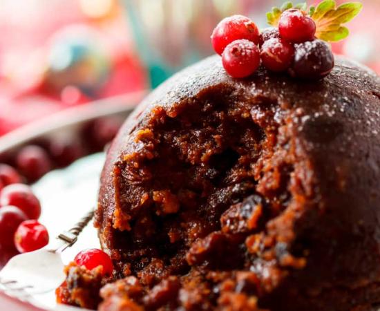 The traditional British Christmas pudding has evolved over the years into a sweet delicacy of fruits and nuts. Source: Maksim Shebeko / Adobe Stock