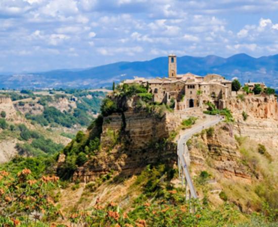 Civita di Bagnoregio an ancient, dying city atop a crumbling rock. Source: JethroT / Adobe Stock.