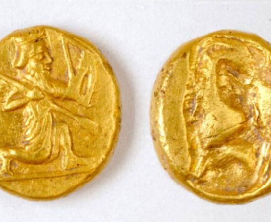 Archaeologists discovered a pot of gold Persian coins, called darics, at the ancient city of Notion in Turkey. The coins show a figure of a kneeling archer, the characteristic design of the Persian daric, a type of gold coin issued by the Persian Empire.	Source: Photo courtesy of Notion Archaeological Project, University of Michigan