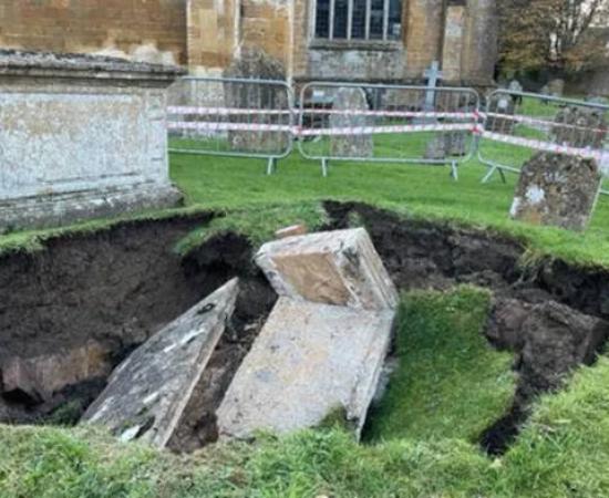 The collapsed tomb in the graveyard of All Saints Chuech, Martock, Somerset.