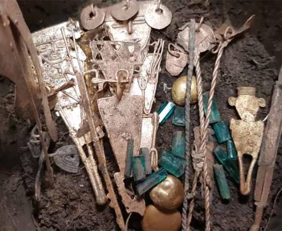 8 Jars Of Colombian Emeralds, Gold, and Silver Unearthed Near Bogotá