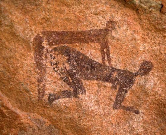 Cave art depicting two figures copulating from Jabbaren, Algeria. Source: Trust for African Rock Art / Fair Use