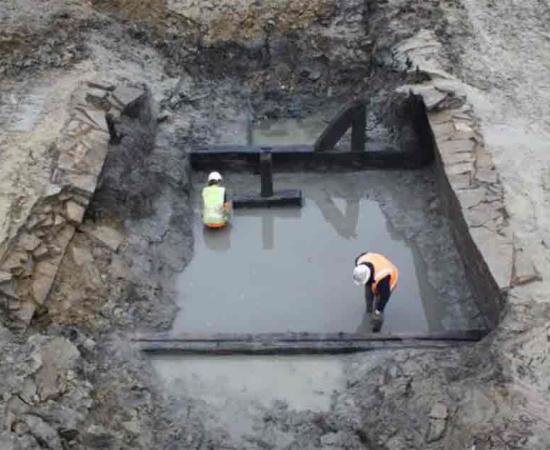 Remnants of the wooden bridge over the medieval moat found in Tewkesbury, England. Source: Cotswold Archaeology