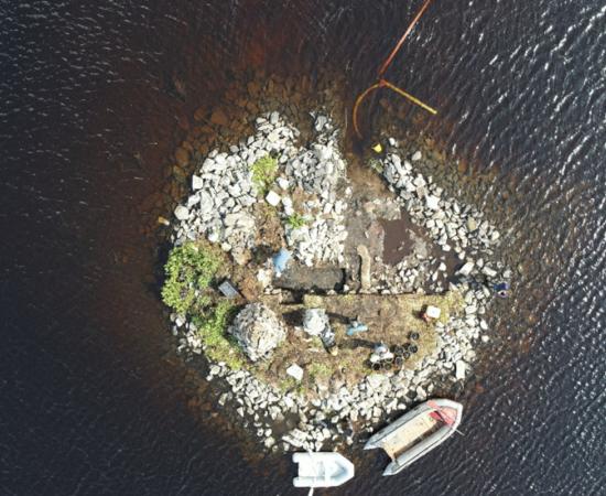 Aerial view of the Loch Bhorgastail crannog on the Isle of Lewis, Scotland