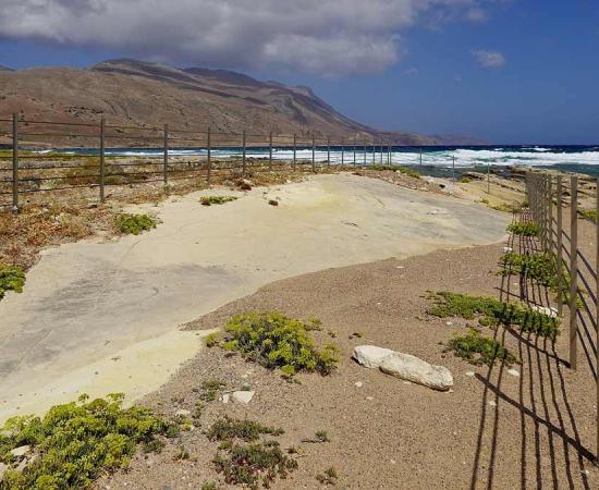 The rock slab at Trachilos, Crete, where the 6-million-year-old hominin Crete footprints were first discovered in 2002.	Source: Olaf Tausch / CC BY 3.0