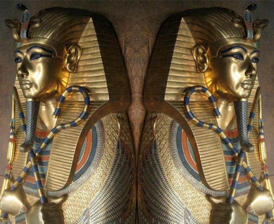 Sarcophagus of Tutankhamun with close up on the crook and flail. 	Source: Public Domain