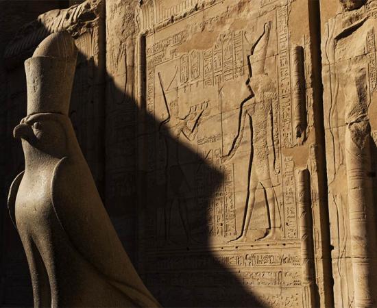 The god Horus represented by a falcon at the Temple of Edfu. Source: Edyta / Adobe Stock