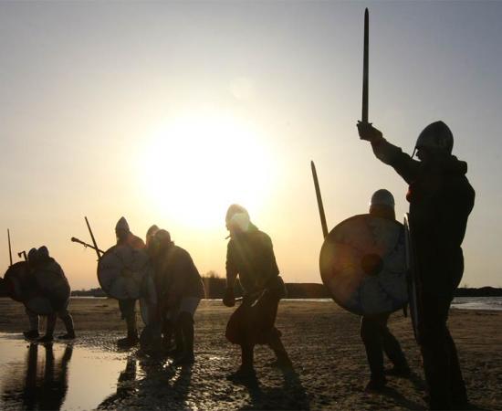 Known to all and feared by many, the Curonians were famed for their prowess in battle, strong warrior culture, and an infamous reputation of raiding and plundering their neighboring shores. Source: destillat / Adobe Stock