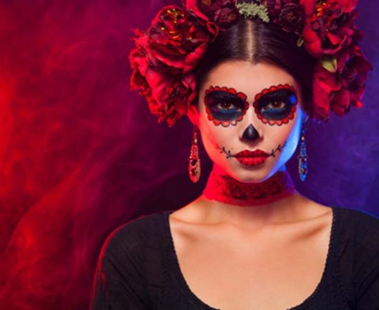 Lady dressed up as La Catrina for Dia de los Muertos.