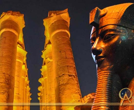 : The 14 columns of the The Colonnade of Amenhotep III - Luxor Temple and Statue of the Pharaoh