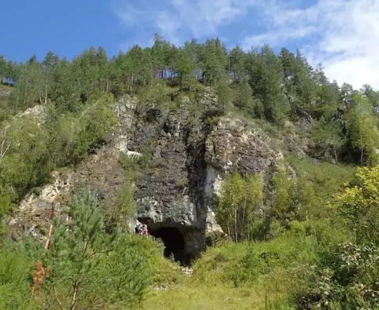 The entrance to the Denisova cave in the Altai Mountains of Siberia where the so-called new “Denisova Cave DNA” has proven, for the first time, the Neanderthals, Denisovans and Homo sapiens occupied the same cave at the same time sometimes!   Source: Professor Richard G. Roberts / University of Wollongong  By Ashley Cowie