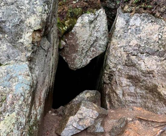 Nestled within Koli National Park, the Pirunkirkko cave, known as the Devil's Church in English, has become renowned for its purported connection to the spirit realm. Source: University of Eastern Finland