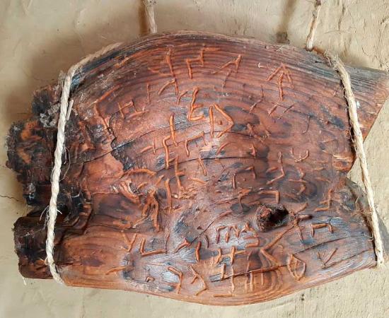 Model reproduction of the Dispilio tablet at the prehistoric lakeside settlement of Dispilio in northern Greece. Source: Мико / CC BY-SA 4.0