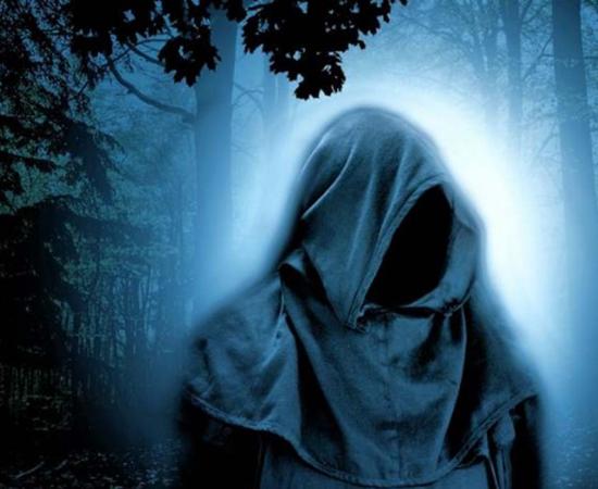 Representative image of a cloaked druid in a forest.