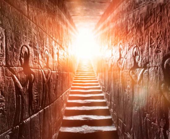 Egypt’s Edfu temple with its passage lined by two glowing walls full of Egyptian hieroglyphs. Source: Konstantin/Adobe Stock	