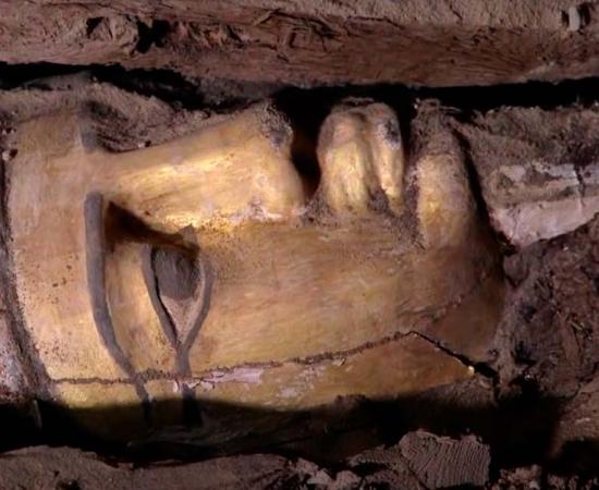 Egyptian coffin awaiting extraction, Saqqara. Source: YouTube Screenshot / Smithsonian Channel.