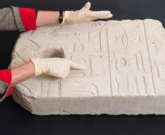 The Egyptian artifact / anchor shown with hieroglyphs found on the seabed. Source: Laura Lachman / Israel Museum