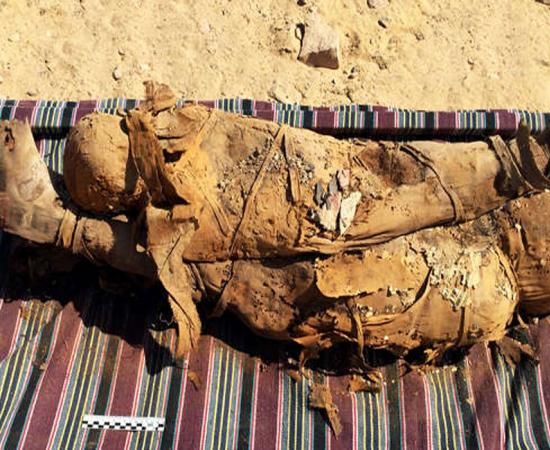 Two of the mummies discovered in the Egyptian tomb in Aswan. 