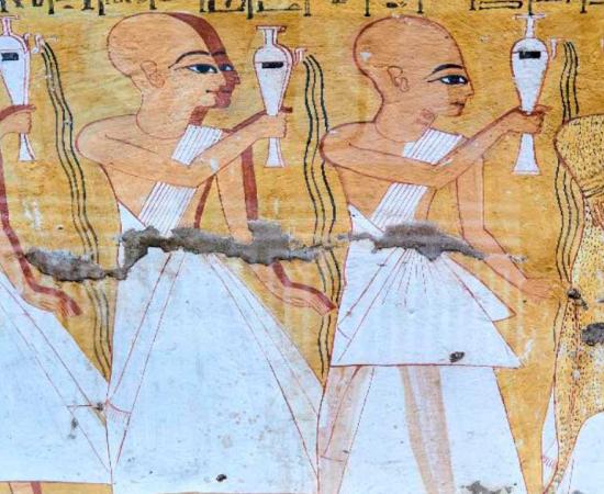 A mural from the tomb Inkherkhau (TT359) on the West Bank of Nile - Thebes, Luxor, depicting a funerary procession with ancient Egyptian priests performing libations, the first one wearing leopard skin. Source: Svetlaili /Adobe Stock