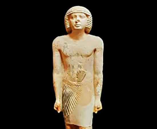 Unique limestone family statue from Gisr el-Mudir, Saqqara, showing nobleman with wife and daughter in mixed artistic styles from the Fifth Dynasty period