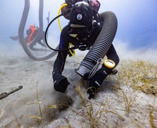 marine archaeologists excavate the wreck of the Mentor, off the coast of Kythera, Greece.